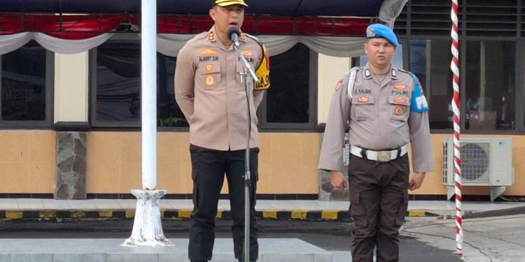 Kapolres Bitung _AKBP ALBERT ZAI.,SIK.,MH_* Pimpin Apel Kesiapan dalam rangka pengamanan malam tahun baru 2025 di Wilayah Kota Bitung