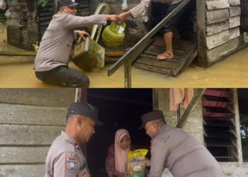 Personel Polsek Indra Makmu Bantu Warga dan Serahkan Beras Kepada Warga Yang Terdampak Banjir